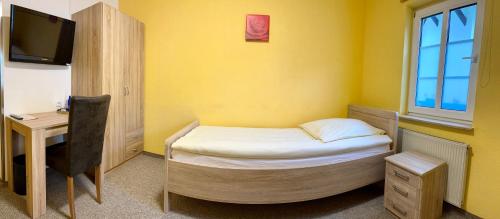 TV a/nebo společenská místnost v ubytování Hotel La-Pergola