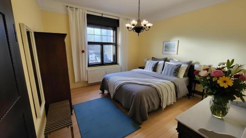 Ένα ή περισσότερα κρεβάτια σε δωμάτιο στο Ferienwohnung im Musikerviertel