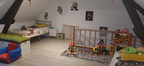 Postel nebo postele na pokoji v ubytování Maison individuelle Le Royaume Sauvage Gîte