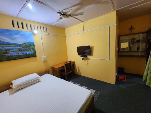 Ένα ή περισσότερα κρεβάτια σε δωμάτιο στο The Naturalist's Hideaway