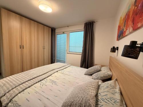 Postel nebo postele na pokoji v ubytování Apartma Rebolj