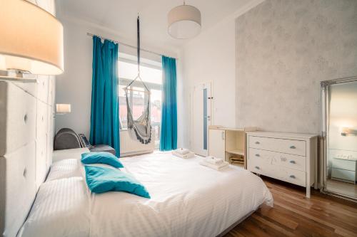 En eller flere senge i et værelse på Apartment by Cathedral