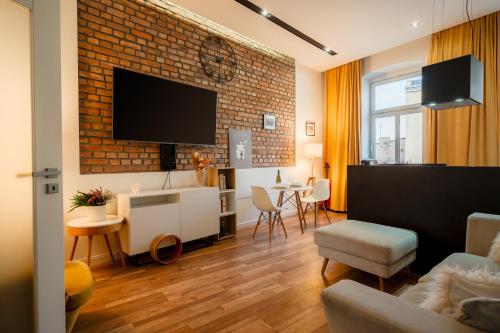 Et tv og/eller underholdning på Apartment by Cathedral