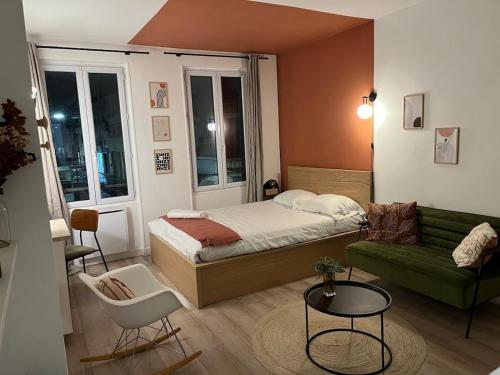 En eller flere senge i et værelse på Le studio parisien