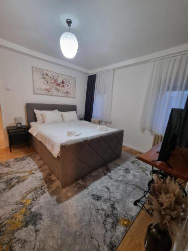 Postel nebo postele na pokoji v ubytování Apartman Helena - Self check in