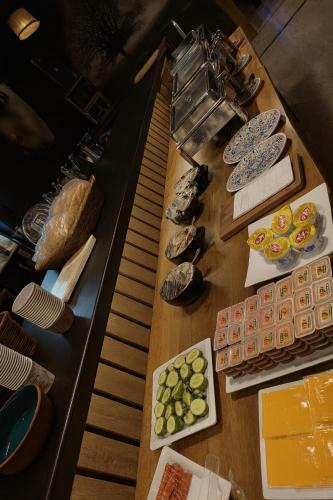 a buffet line with food on a table at البيت الايطالي - Italiano House in Baghdād