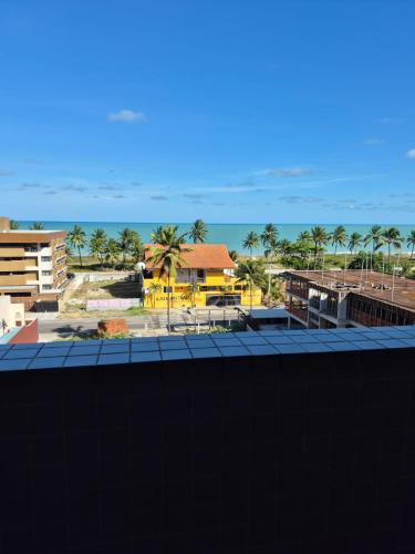 a view of the ocean from a resort at Apartamento Cancún - Praia de Intermares, a 100 metros da Praia in Cabedelo
