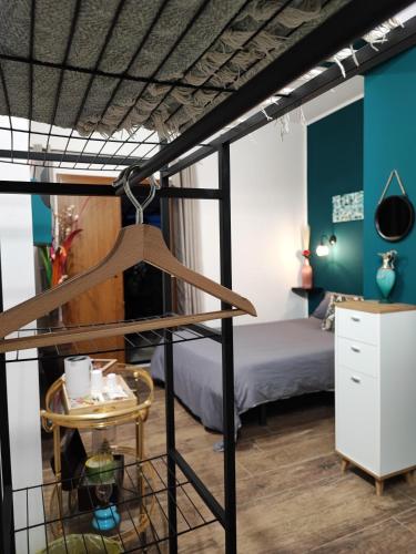 a bedroom with a bunk bed and a table at Living G Room in Cagliari