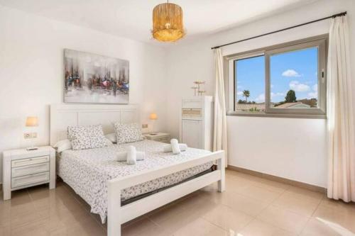 Ένα ή περισσότερα κρεβάτια σε δωμάτιο στο Villa Pina 20