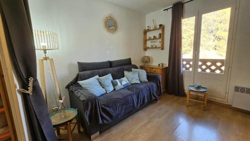 Ένα ή περισσότερα κρεβάτια σε δωμάτιο στο Cozy studio