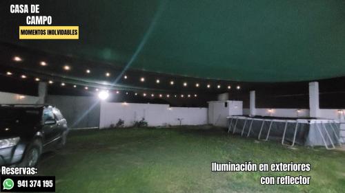 a car parked in a parking lot at night at Escápate con tu pareja sin salir de Lima in Cieneguilla