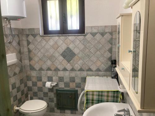 Ένα μπάνιο στο Olivastro