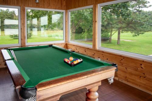 Biliár nebo kulečník v ubytování Kurzemes pērle