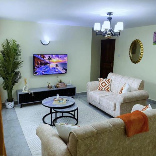 Χώρος καθιστικού στο Zerubbabel Apartmerns B002