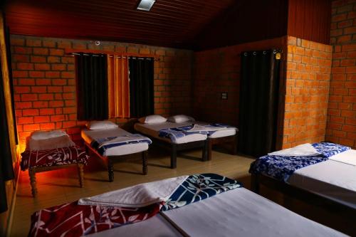 Ένα ή περισσότερα κρεβάτια σε δωμάτιο στο Veeras Western Sparrow Homestay