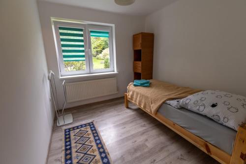 Postel nebo postele na pokoji v ubytování Agroturystyka Na górce