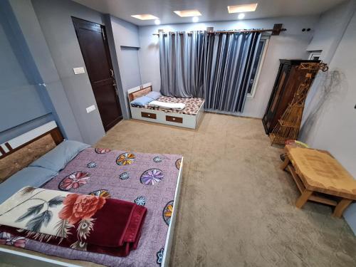 Llit o llits en una habitació de KTM Homestay