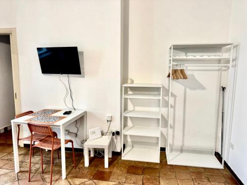 Een TV en/of entertainmentcenter bij Casa Genovesi 5
