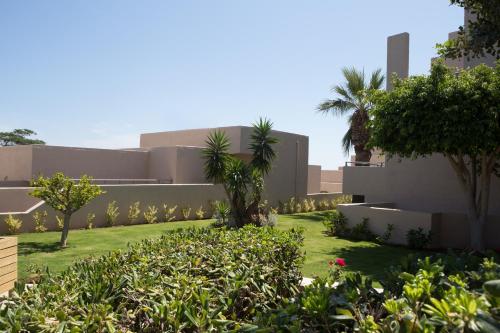 Un jardín fuera de Sundance Apartments & Suites