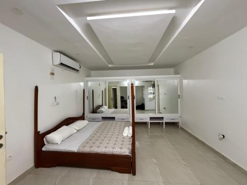 Voodi või voodid majutusasutuse RESIDENCE LUXORIA Villa Cotonou toas