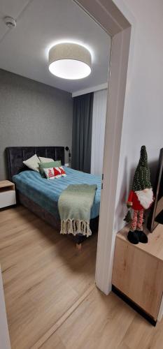 Postel nebo postele na pokoji v ubytování Apartament Zatoka Snów z widokiem na morze 3,5h od Wawy