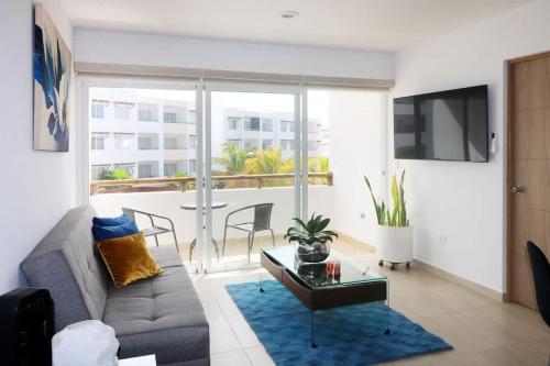 TV a/nebo společenská místnost v ubytování Hermoso departamento en cerritos