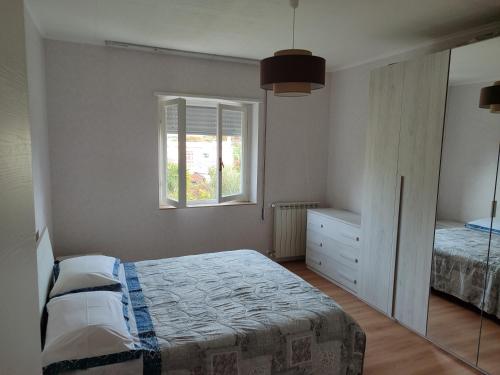 Postel nebo postele na pokoji v ubytování Casa Vacanze I Cedri