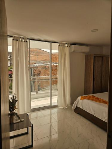 Ένα ή περισσότερα κρεβάτια σε δωμάτιο στο Apto N 302 vacacional