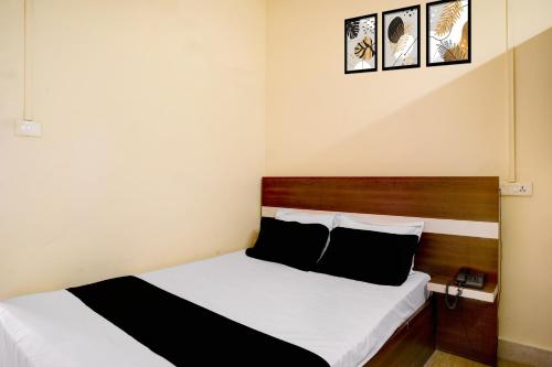 Ένα ή περισσότερα κρεβάτια σε δωμάτιο στο Hotel O SUNLEAF GUEST HOUSE