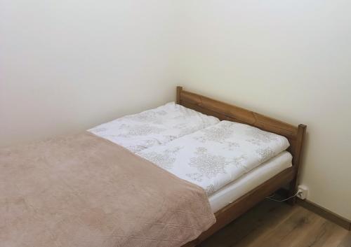 Postel nebo postele na pokoji v ubytování Apartament na Manhattanie