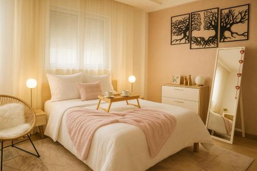 Postel nebo postele na pokoji v ubytování Confort et Piscine, à 5 min de Rabat et Aéroport