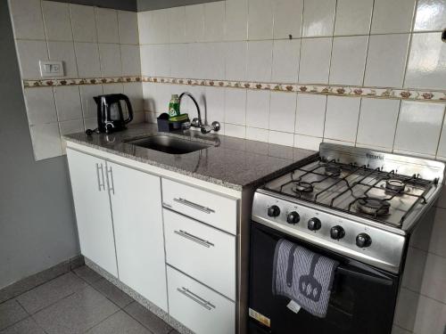 Η κουζίνα ή μικρή κουζίνα στο Hospedaje Rincón del Sur22