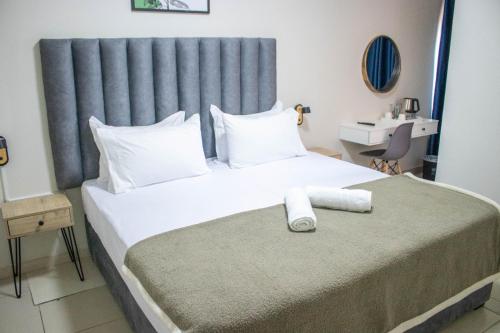 Ένα ή περισσότερα κρεβάτια σε δωμάτιο στο Moriti Inn Guest House