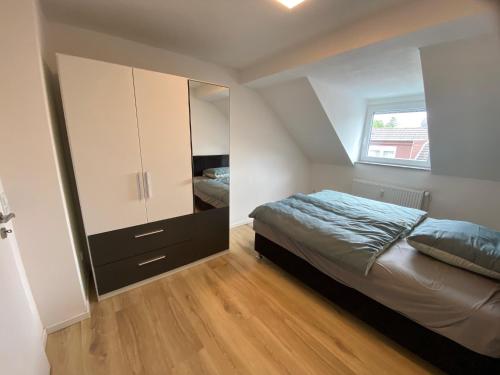 Un pat sau paturi într-o cameră la Minos Unterkunft