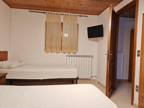 Postel nebo postele na pokoji v ubytování casetta dello zio