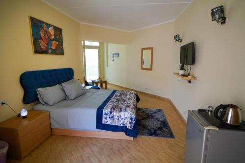 Postel nebo postele na pokoji v ubytování porto view red sea