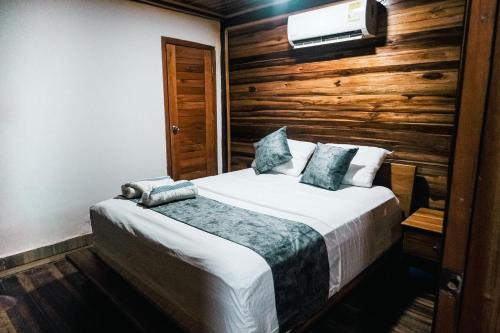 Postel nebo postele na pokoji v ubytování Cabaña Kokkos Del Mar