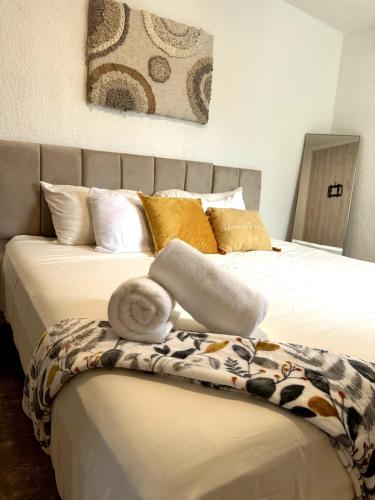 Postel nebo postele na pokoji v ubytování Privada cerca de playa con Jacuzzi, BBQ y Terraza