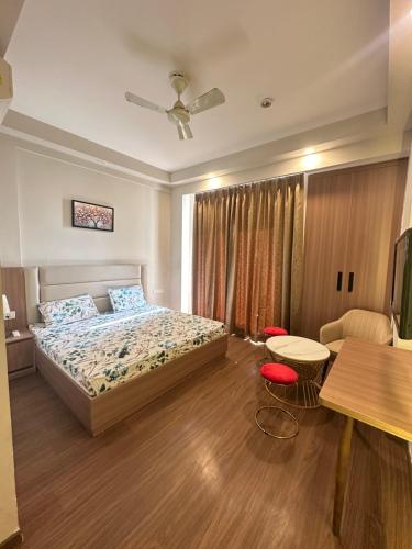 Ένα ή περισσότερα κρεβάτια σε δωμάτιο στο Paradise stay