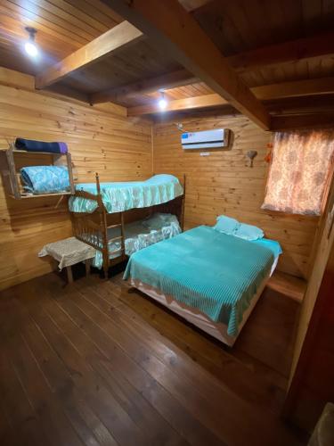Ένα ή περισσότερα κρεβάτια σε δωμάτιο στο Cabaña "mainimbu"