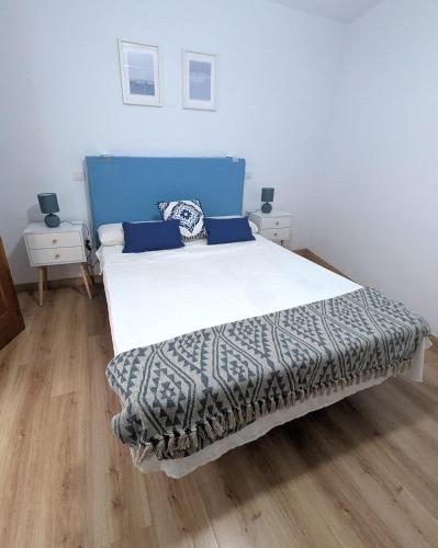 Postel nebo postele na pokoji v ubytování Casa Los Tilos