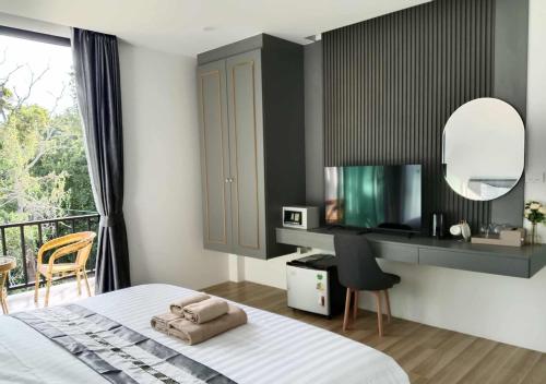 Ένα ή περισσότερα κρεβάτια σε δωμάτιο στο Ck Home Lanta