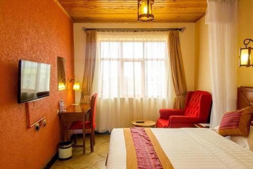 Μια τηλεόραση ή/και κέντρο ψυχαγωγίας στο Seasons Hotel Nairobi