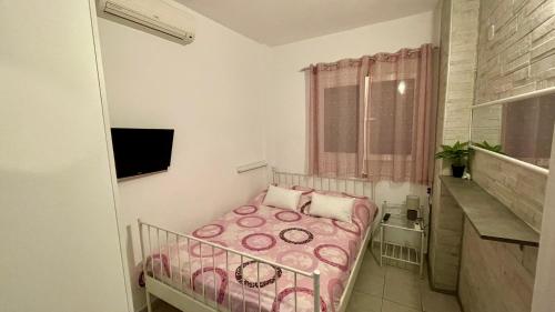 Postel nebo postele na pokoji v ubytování Mina’s house