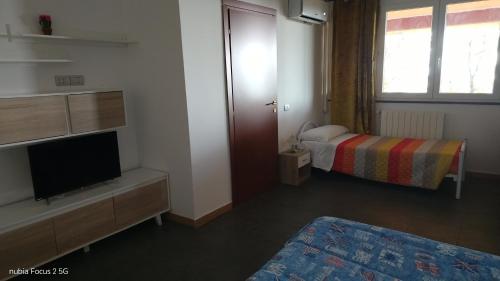 Postel nebo postele na pokoji v ubytování Oasi del benessere