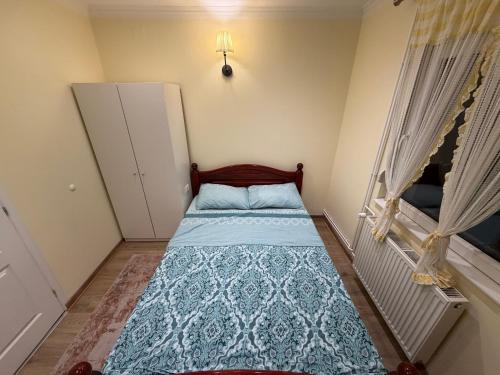 Postel nebo postele na pokoji v ubytování Ravana Sky Apartments