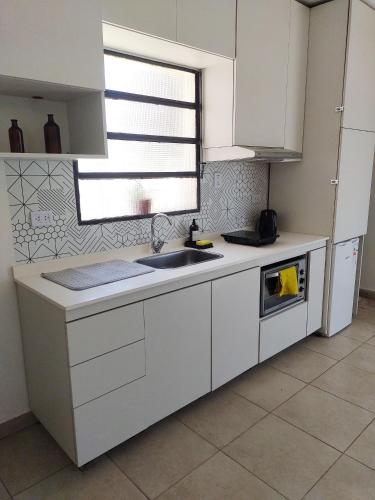 Η κουζίνα ή μικρή κουζίνα στο Hospedaje Aguilares