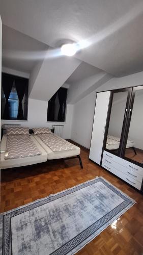 Postel nebo postele na pokoji v ubytování Atika