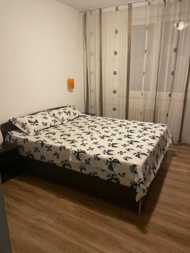 Postel nebo postele na pokoji v ubytování Apartament Calea București
