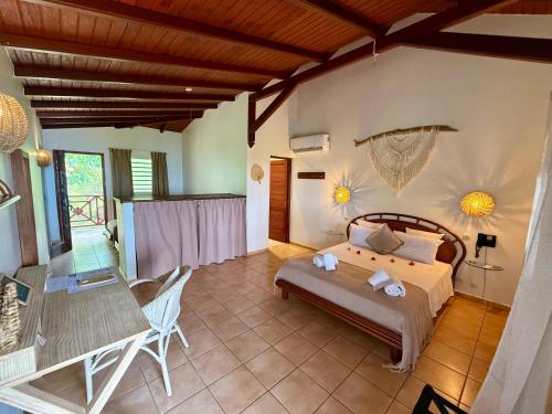 Postel nebo postele na pokoji v ubytování Residence AU 'TI SUCRIER